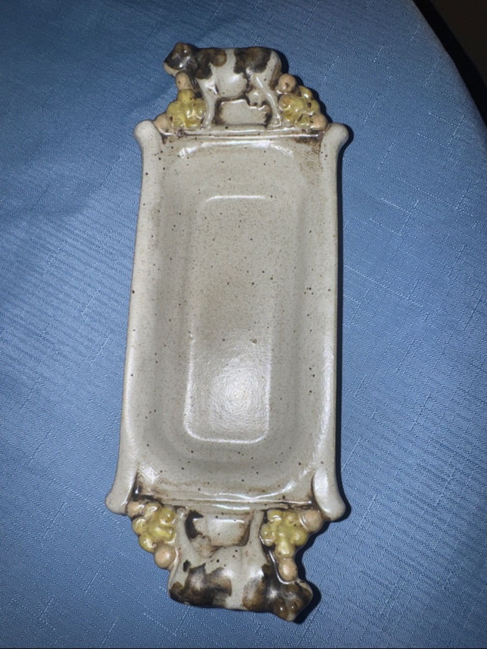 Sold
Bob Anderson Hand-Crafted Pottery Cow Flower Butter Dish Trinket tray 9”